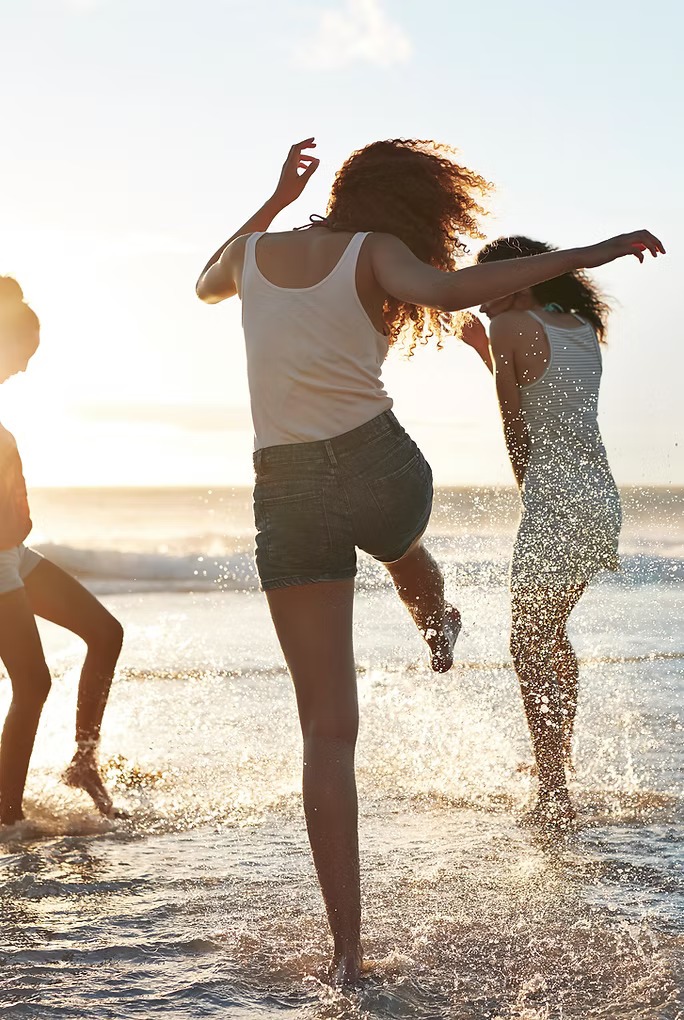 Friends having fun on the beach